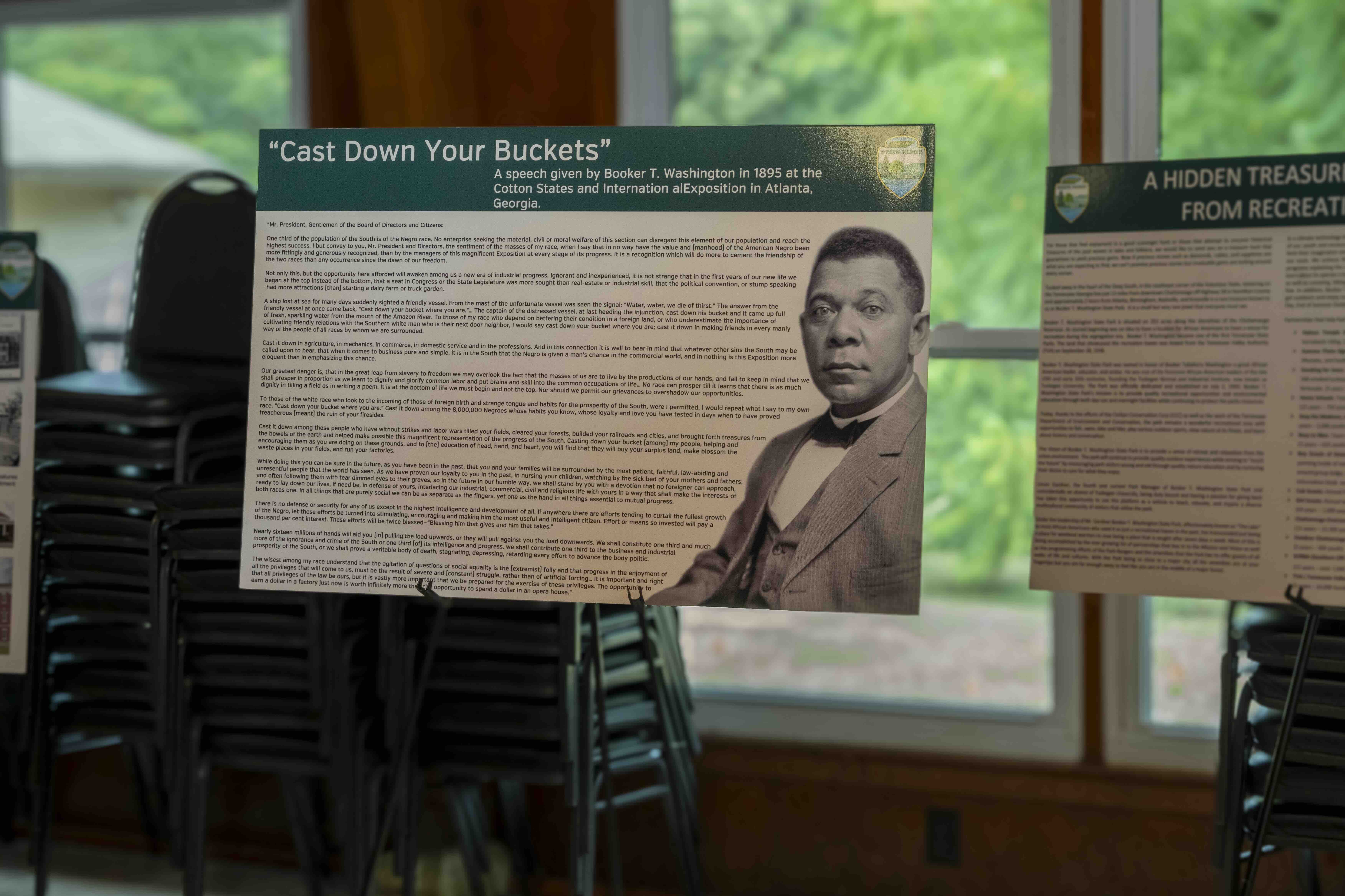 Exhibit panels about Booker T. Washington in a museum setting.