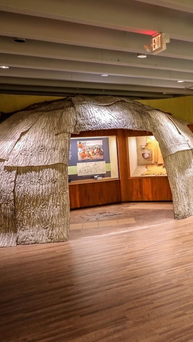 historical native american wigwam inside a building