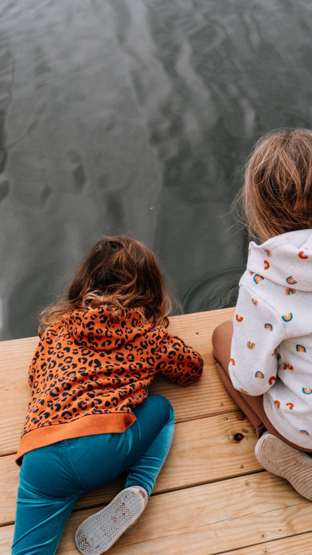 Two kids at the fishing pier at Chickasaw State Park by Kari Edgens