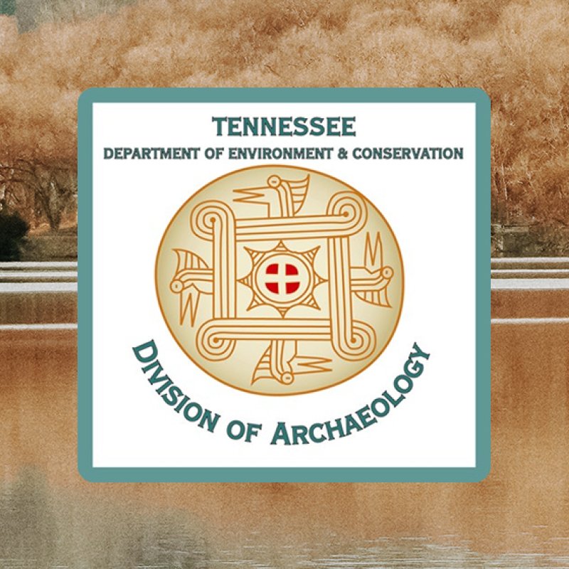Logo of the Tennessee Division of Archaeology over a serene lake with autumn trees. The emblem features stylized designs and text in green.