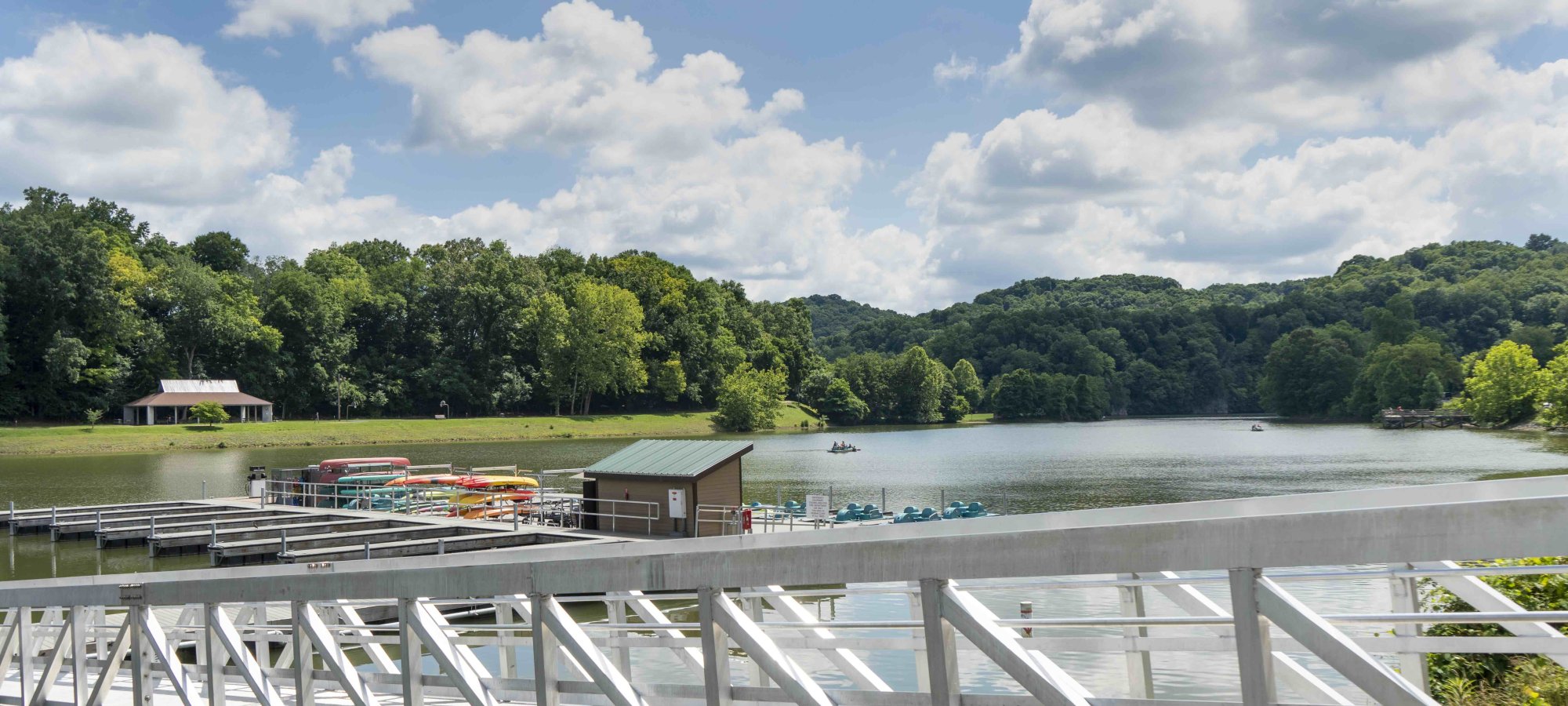 A long accessible ramp leading to a wooden dock.
