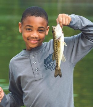 Youth Holding Bass
