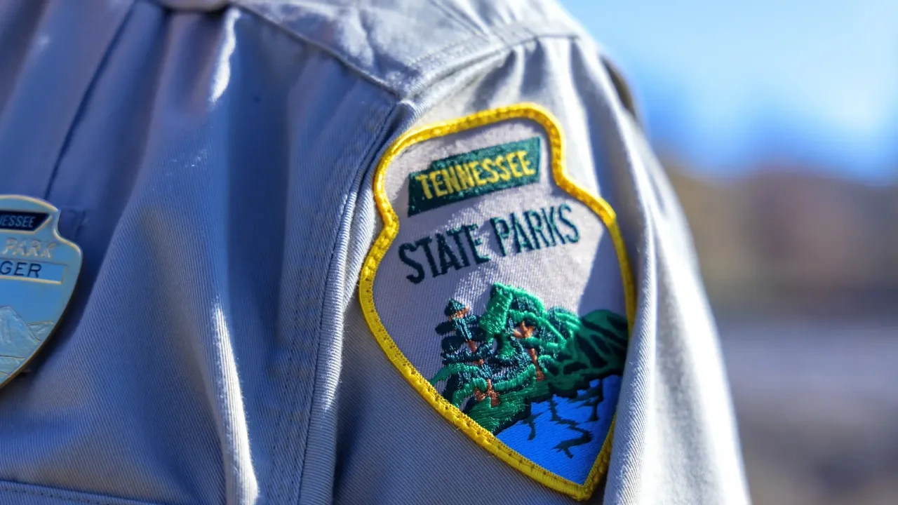 Tennessee State Parks ranger uniform patch on a shirt.