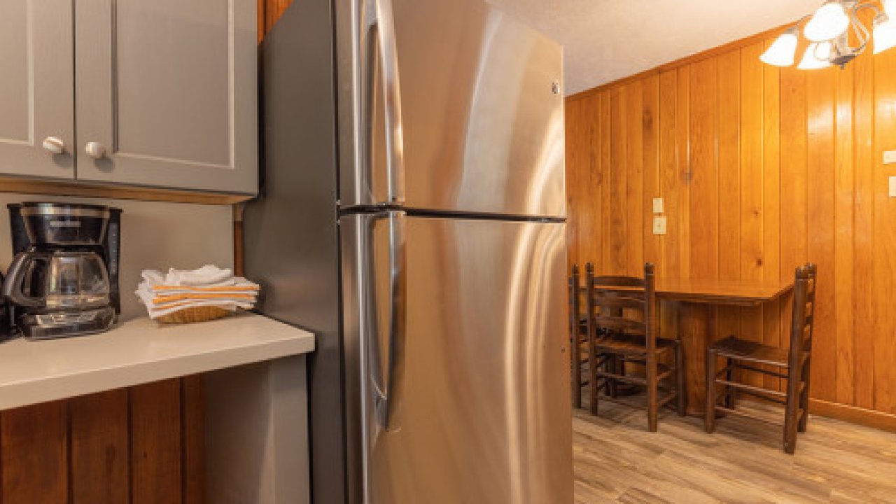 rustic kitchen with stainless steel appliances