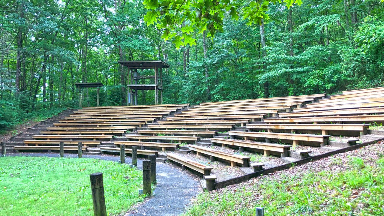 amphitheater side view with wood benches in semicircle 