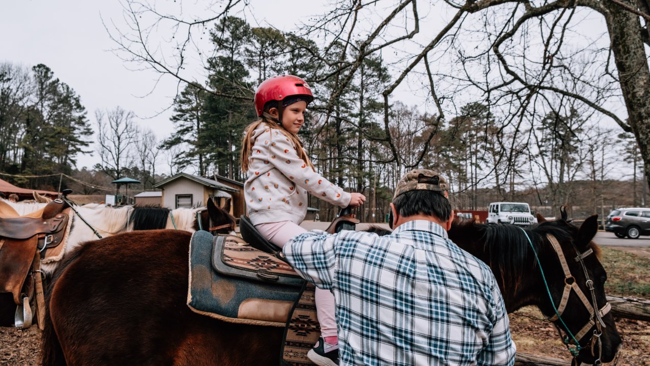 Child Horseback Riding at Chickasaw State Park by Kari Edgens
