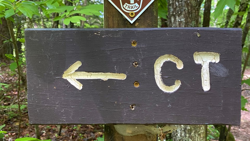 Cumberland trail brown wooden sign post and marker