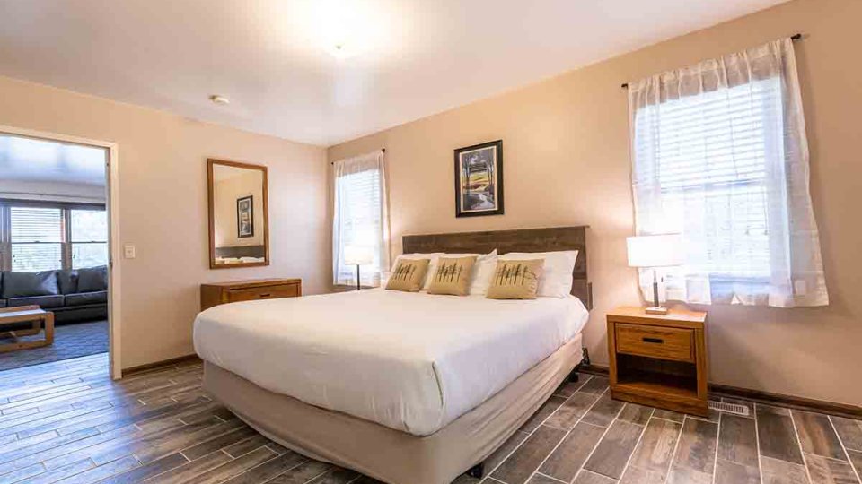 one large bed with white covers