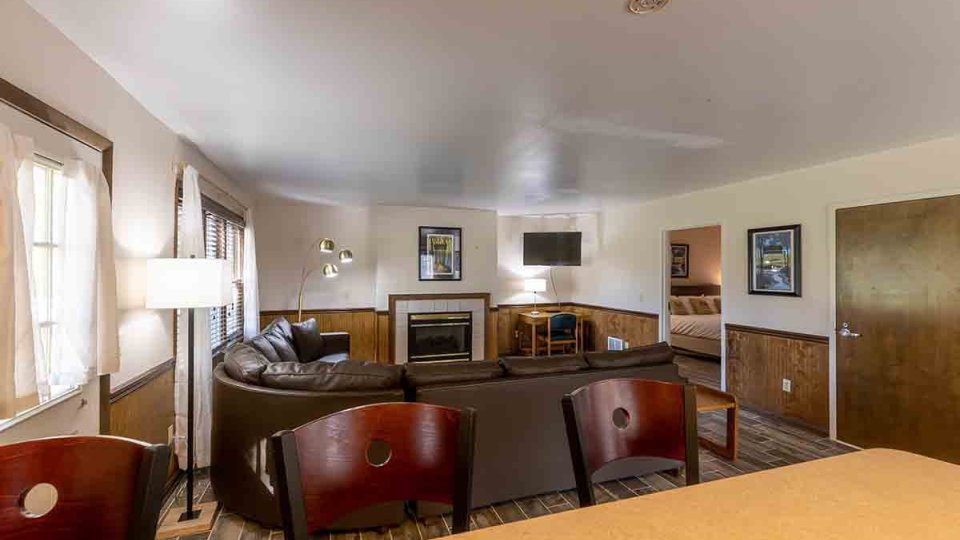 bar stools and kitchen counter seats in living room