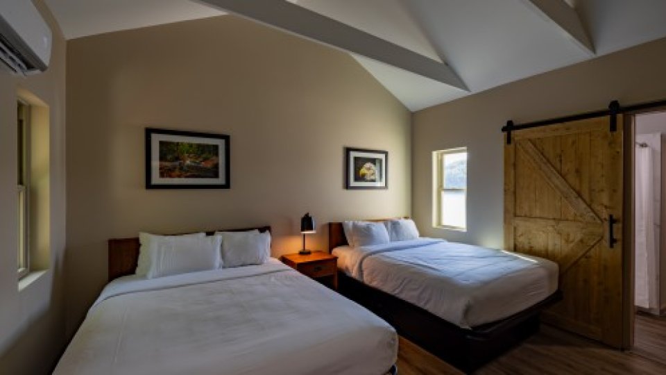 2 beds in a sunlight bedroom