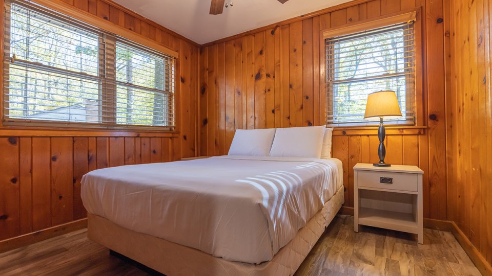 one bed in a rustic room
