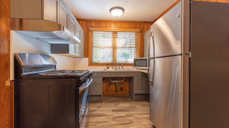 rustic kitchen with everything in it
