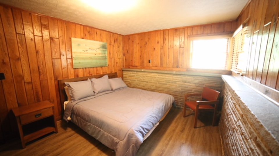 master bedroom, overhead lighting, window and nightstand
