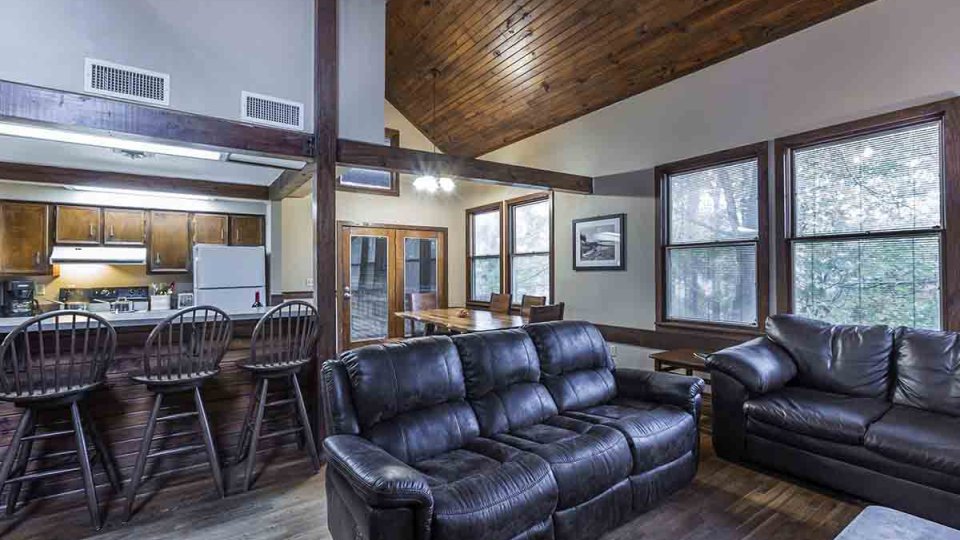 three bedroom cabin, living room vaulted ceiling sectional couch