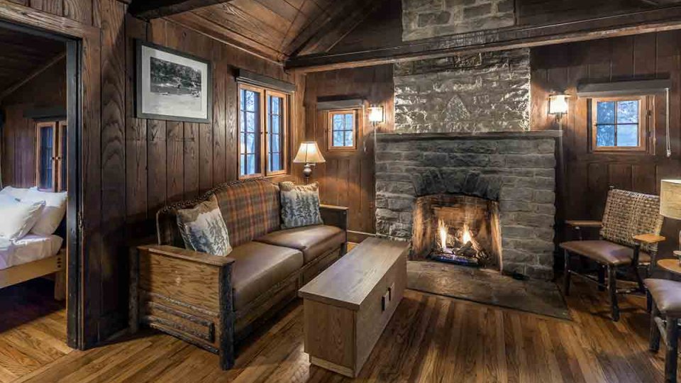 rustic cabin, fireplace living room with loveseat