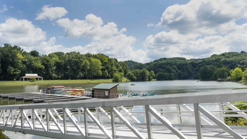 A long accessible ramp leading to a wooden dock.