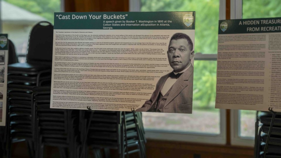 Exhibit panels about Booker T. Washington in a museum setting.