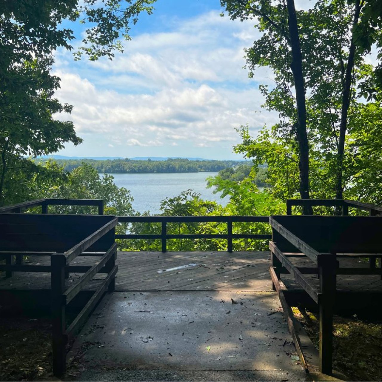 Trail leading to the overlook at tims ford. Wooden rails and platform balcony