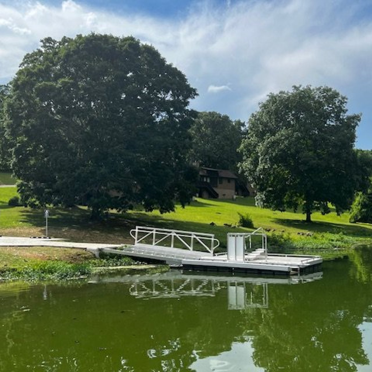Accessible ramp that goes by river for people to get in boats