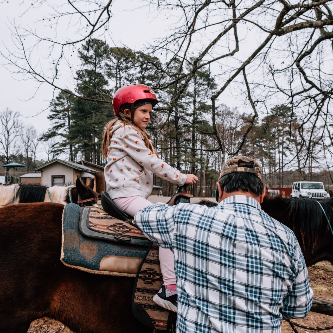 Child Horseback Riding at Chickasaw State Park by Kari Edgens